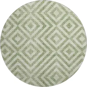 Photo of 8' Green And Beige Geometric Washable Round Rug With UV Protection