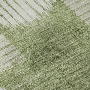 Photo of 8' Green And Beige Geometric Washable Round Rug With UV Protection