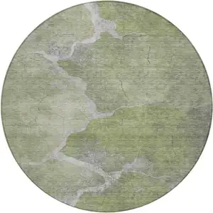 Photo of 8' Green And Beige Round Abstract Washable Indoor Outdoor Area Rug