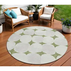 Photo of 8' Green And Beige Round Abstract Washable Indoor Outdoor Area Rug