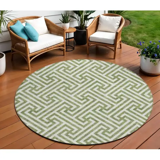 8' Green And Beige Round Geometric Washable Indoor Outdoor Area Rug Photo 1