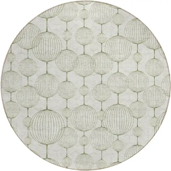 8' Green And Beige Round Geometric Washable Indoor Outdoor Area Rug Photo 1