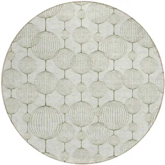 8' Green And Beige Round Geometric Washable Indoor Outdoor Area Rug Photo 1