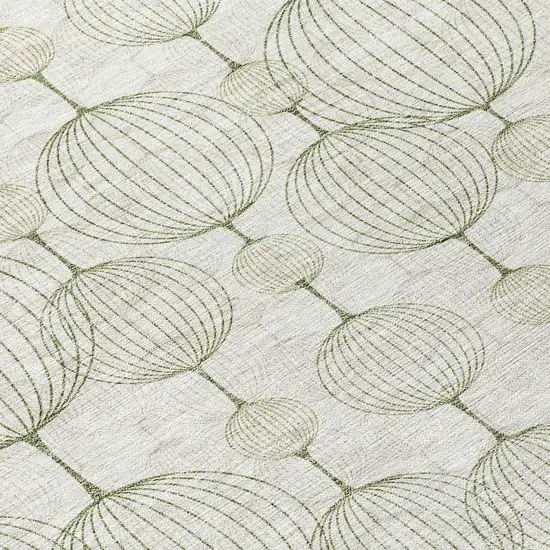 8' Green And Beige Round Geometric Washable Indoor Outdoor Area Rug Photo 9