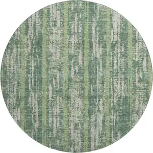 Photo of 8' Green And Beige Striped Washable Round Rug With UV Protection
