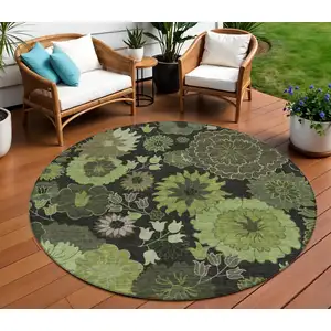 Photo of 8' Green And Black Round Floral Washable Indoor Outdoor Area Rug