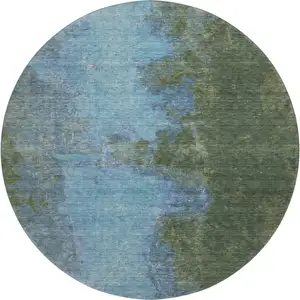 Photo of 8' Green And Blue Abstract Washable Round Rug With UV Protection