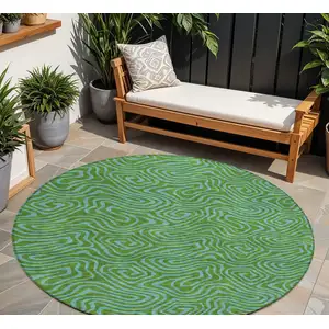 Photo of 8' Green And Blue Round Abstract Washable Indoor Outdoor Area Rug