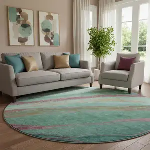 Photo of 8' Green And Blush Abstract Washable Round Rug With UV Protection