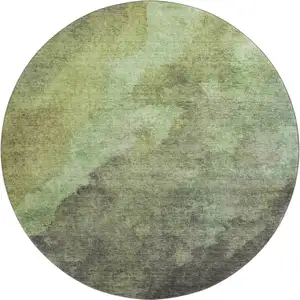 Photo of 8' Green And Charcoal Abstract Washable Round Rug With UV Protection
