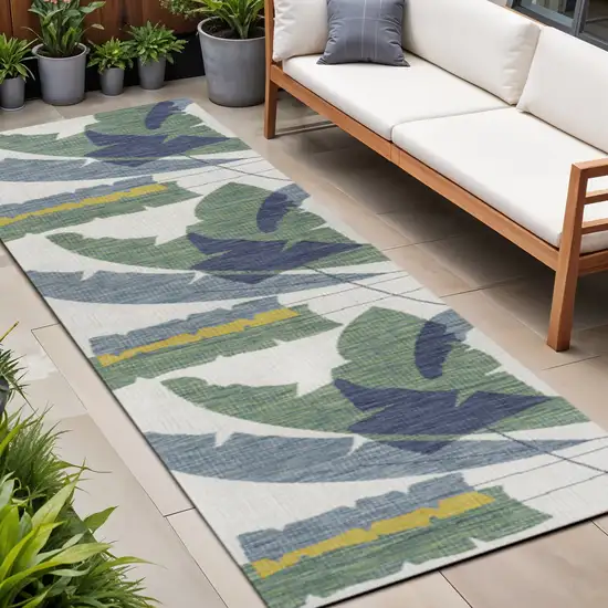 8' Green And Cream Abstract Indoor Outdoor Runner Rug Photo 1