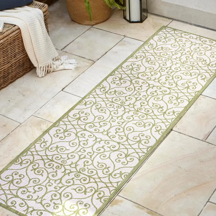 8' Green And Cream Geometric Indoor Outdoor Runner Rug Photo 5