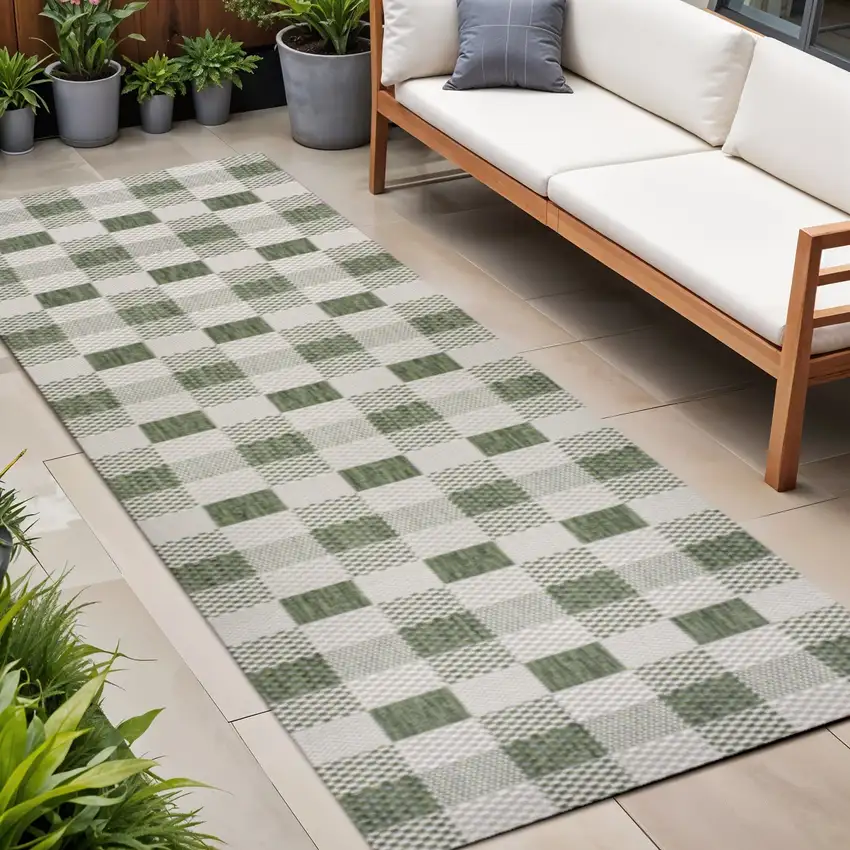 8' Green And Cream Geometric Indoor Outdoor Runner Rug Photo 1