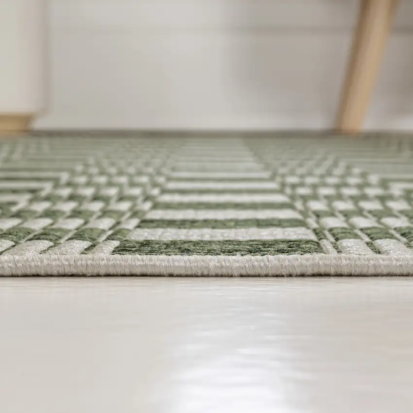 8' Green And Cream Geometric Indoor Outdoor Runner Rug Photo 7
