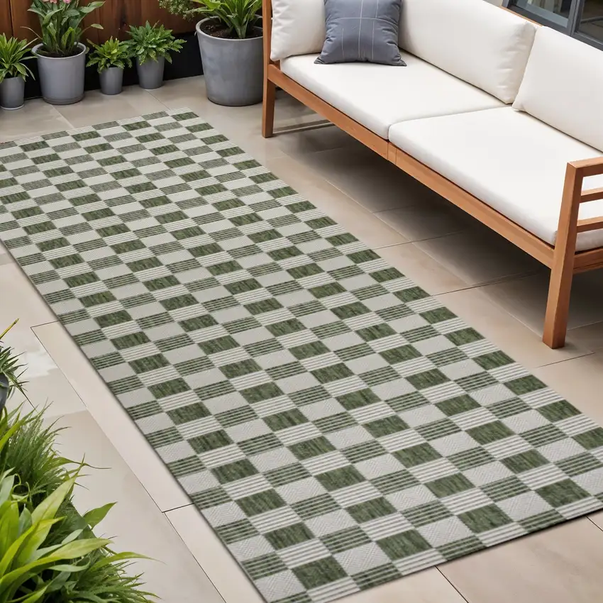8' Green And Cream Geometric Indoor Outdoor Runner Rug Photo 1