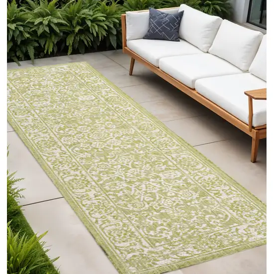 10' Green And Cream Medallion Indoor Outdoor Runner Rug Photo 1