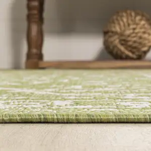 Photo of 10' Green And Cream Medallion Indoor Outdoor Runner Rug