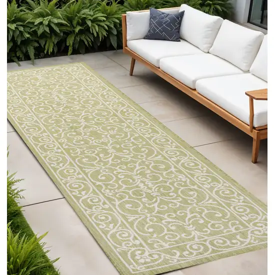 8' Green And Cream Medallion Indoor Outdoor Runner Rug Photo 1