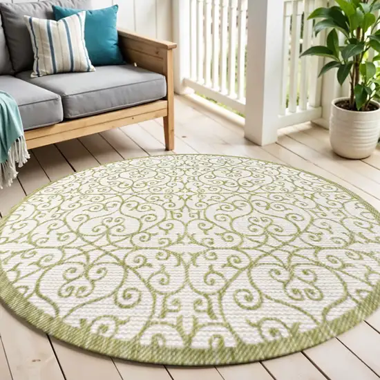 5' Green And Cream Round Geometric Indoor Outdoor Area Rug Photo 1