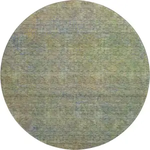 Photo of 8' Green And Gold Abstract Washable Round Rug With UV Protection