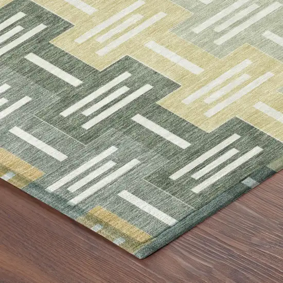 8' Green And Gold Round Geometric Washable Indoor Outdoor Area Rug Photo 5