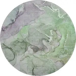 Photo of 8' Green And Gray Abstract Washable Round Rug With UV Protection