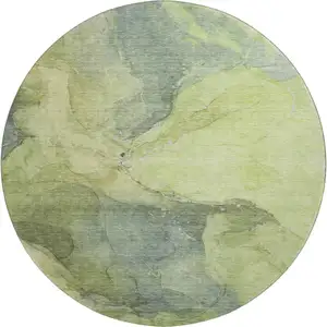 Photo of 8' Green And Gray Abstract Washable Round Rug With UV Protection