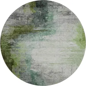 Photo of 8' Green And Gray Abstract Washable Round Rug With UV Protection