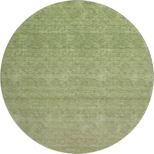 Photo of 8' Green And Gray Ombre Washable Round Rug With UV Protection