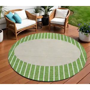 Photo of 8' Green And Gray Round Striped Washable Indoor Outdoor Area Rug
