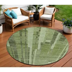 Photo of 8' Green And Gray Round Striped Washable Indoor Outdoor Area Rug
