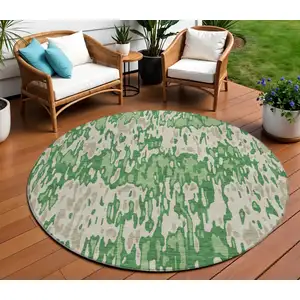 Photo of 8' Green And Gray Round Striped Washable Indoor Outdoor Area Rug