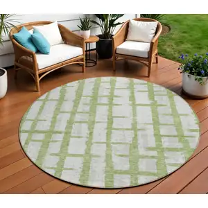 Photo of 8' Green And Gray Round Striped Washable Indoor Outdoor Area Rug