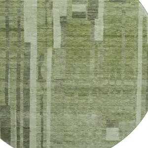 Photo of 8' Green And Gray Striped Washable Round Rug With UV Protection