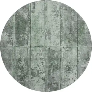 Photo of 8' Green And Gray Striped Washable Round Rug With UV Protection