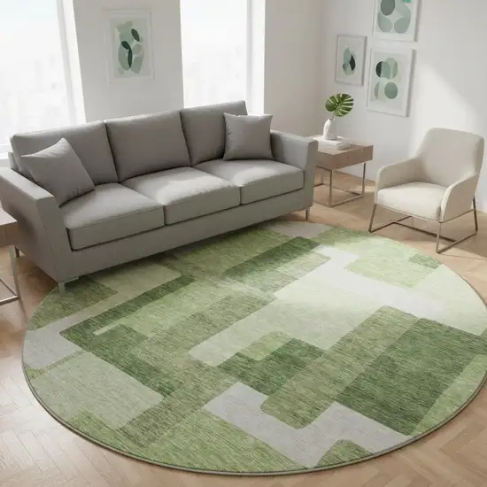 8' Green And Ivory Abstract Geometric Washable Round Rug With UV Protection Photo 2