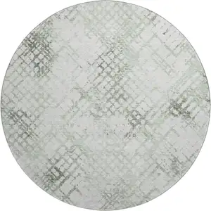 Photo of 8' Green And Ivory Abstract Geometric Washable Round Rug With UV Protection