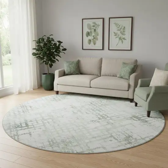 8' Green And Ivory Abstract Geometric Washable Round Rug With UV Protection Photo 1