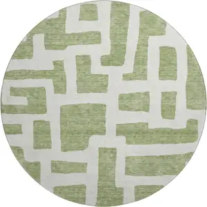 Photo of 8' Green And Ivory Abstract Geometric Washable Round Rug With UV Protection