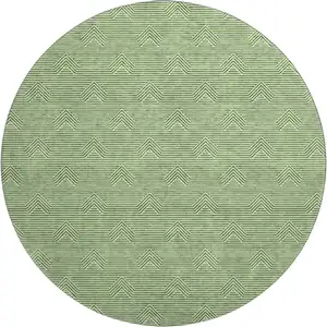 Photo of 8' Green And Ivory Abstract Geometric Washable Round Rug With UV Protection