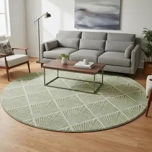 Photo of 8' Green And Ivory Abstract Geometric Washable Round Rug With UV Protection