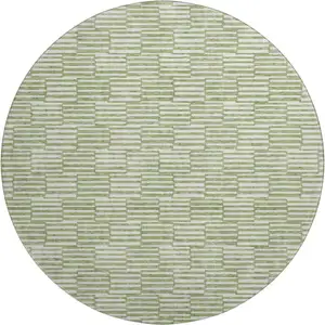 Photo of 8' Green And Ivory Abstract Geometric Washable Round Rug With UV Protection