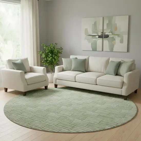 8' Green And Ivory Abstract Geometric Washable Round Rug With UV Protection Photo 1