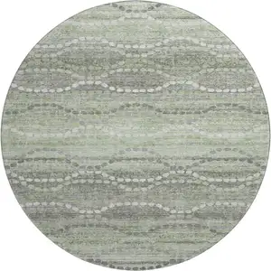 Photo of 8' Green And Ivory Abstract Geometric Washable Round Rug With UV Protection