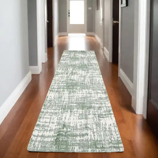 8' Green And Ivory Abstract Runner Rug Photo 1