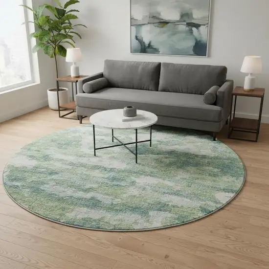 8' Green And Ivory Abstract Washable Round Rug With UV Protection Photo 1