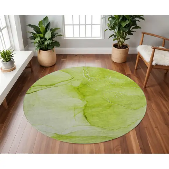 8' Green And Ivory Abstract Washable Round Rug With UV Protection Photo 2