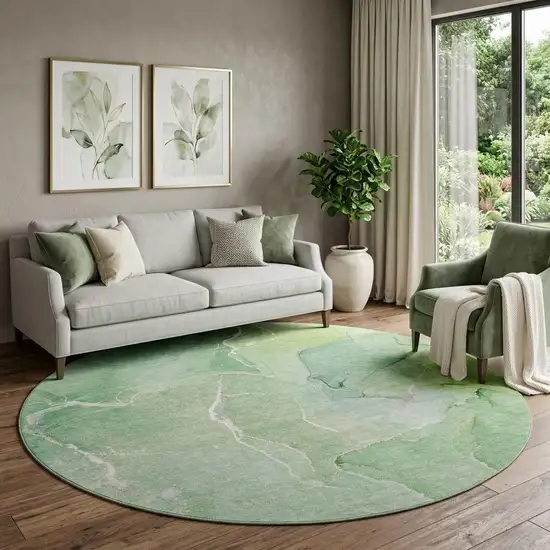 8' Green And Ivory Abstract Washable Round Rug With UV Protection Photo 1