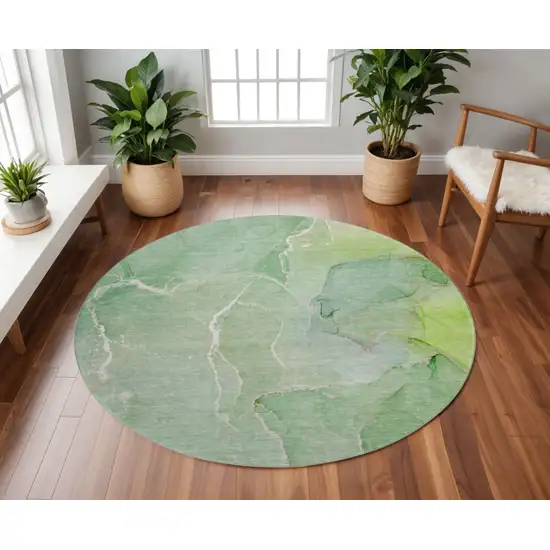 8' Green And Ivory Abstract Washable Round Rug With UV Protection Photo 2