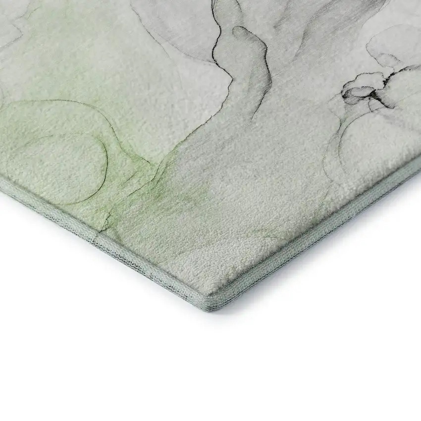 8' Green And Ivory Abstract Washable Round Rug With UV Protection Photo 6